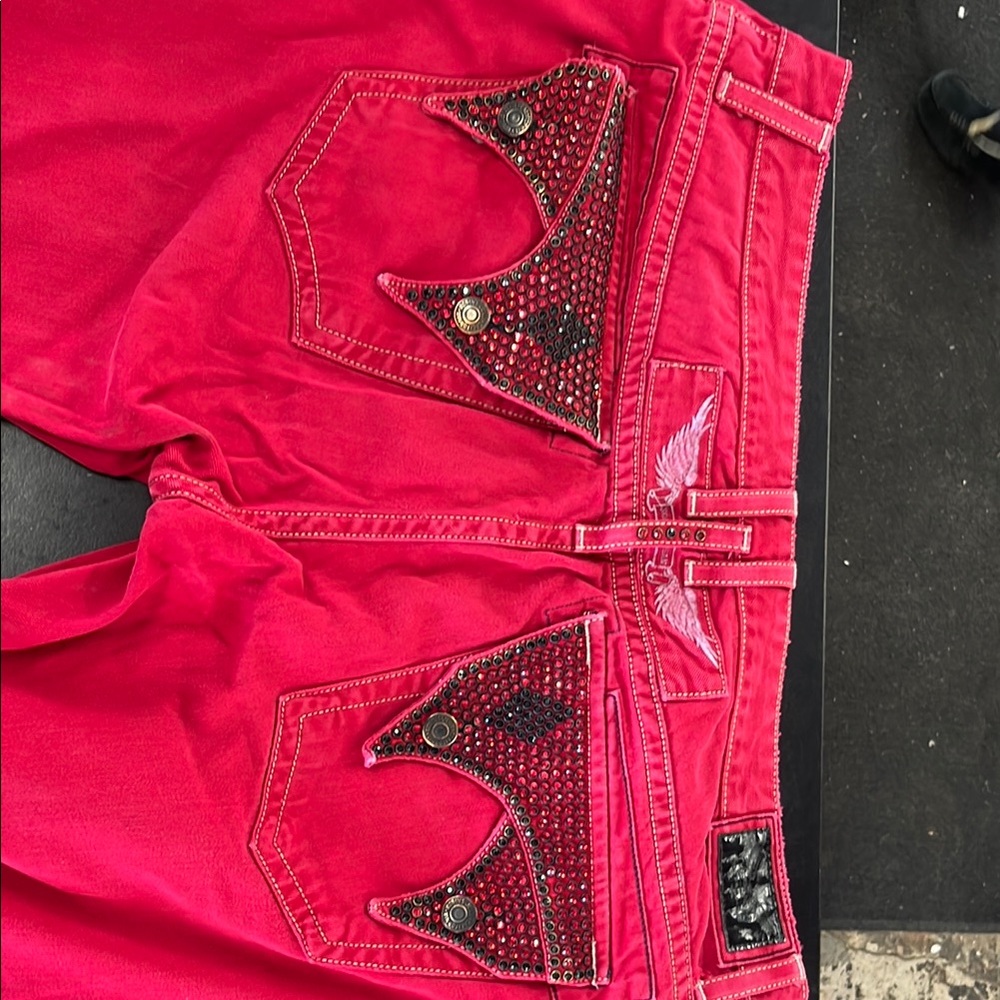 Red Embellished Jeans with Wing Detail